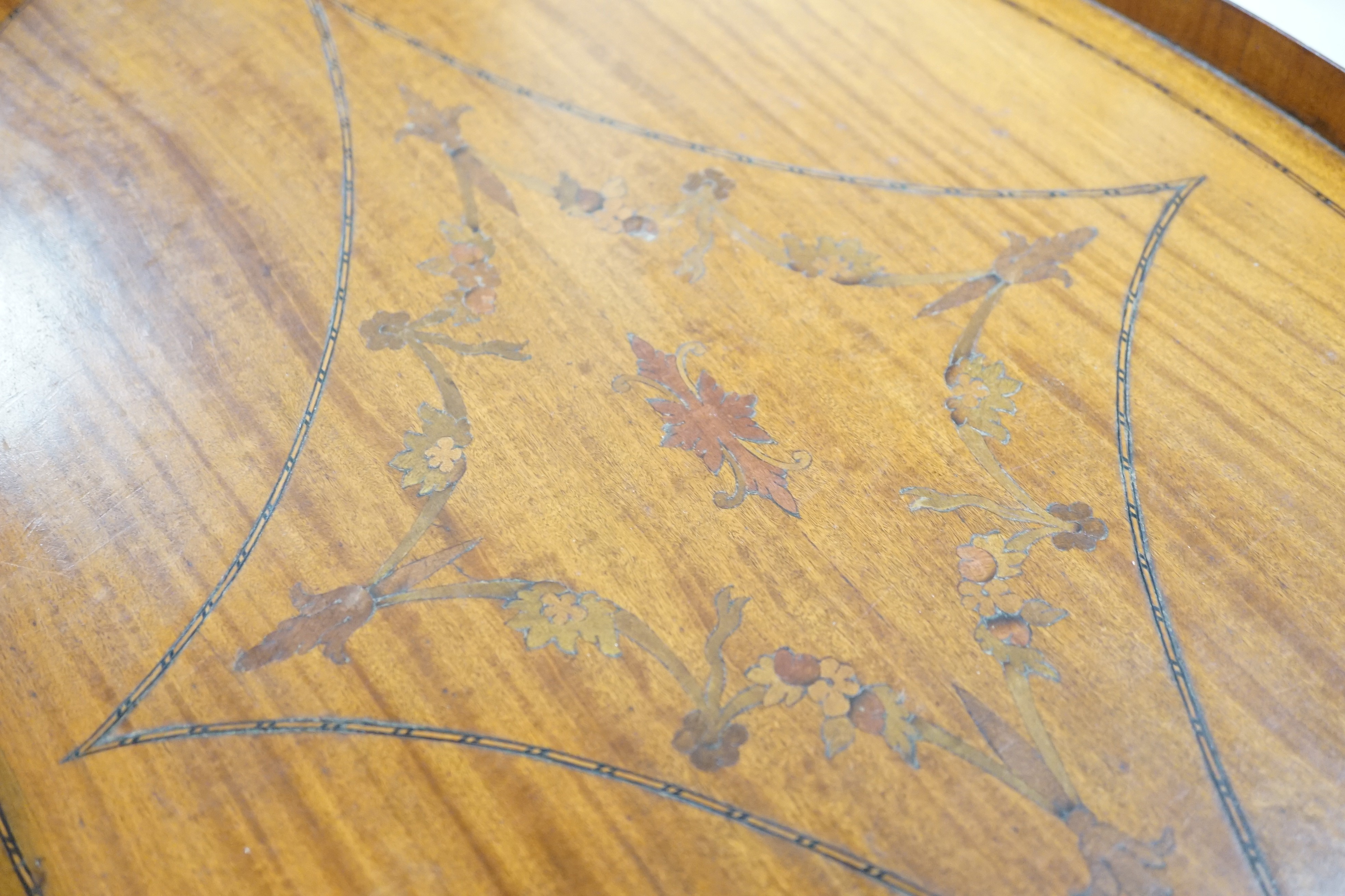 A large oval marquetry satinwood tray. 66cm wide